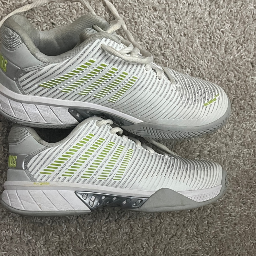 White and Gray Athletic Sneakers with Green Accents